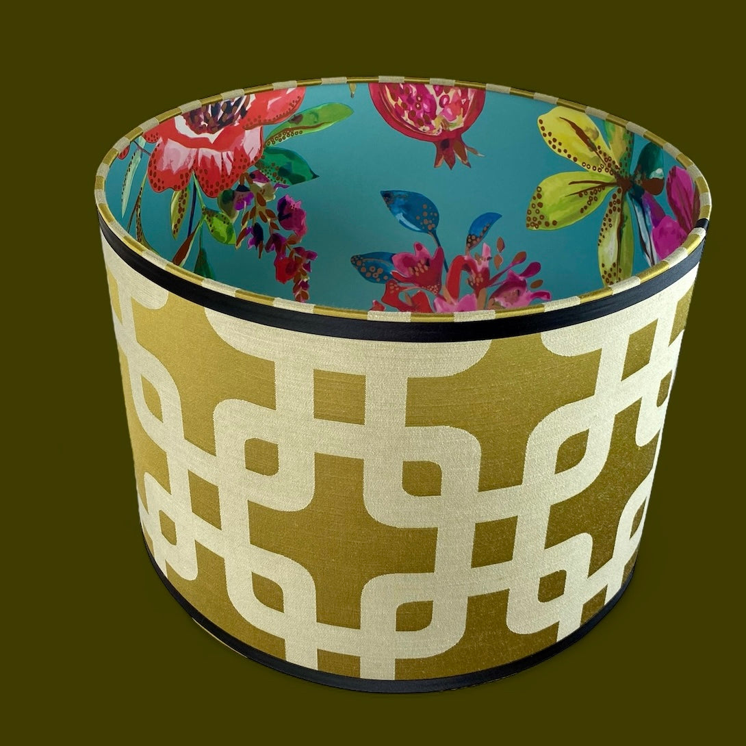 Geometric design lampshade inside lined with pink flowers wallpaper