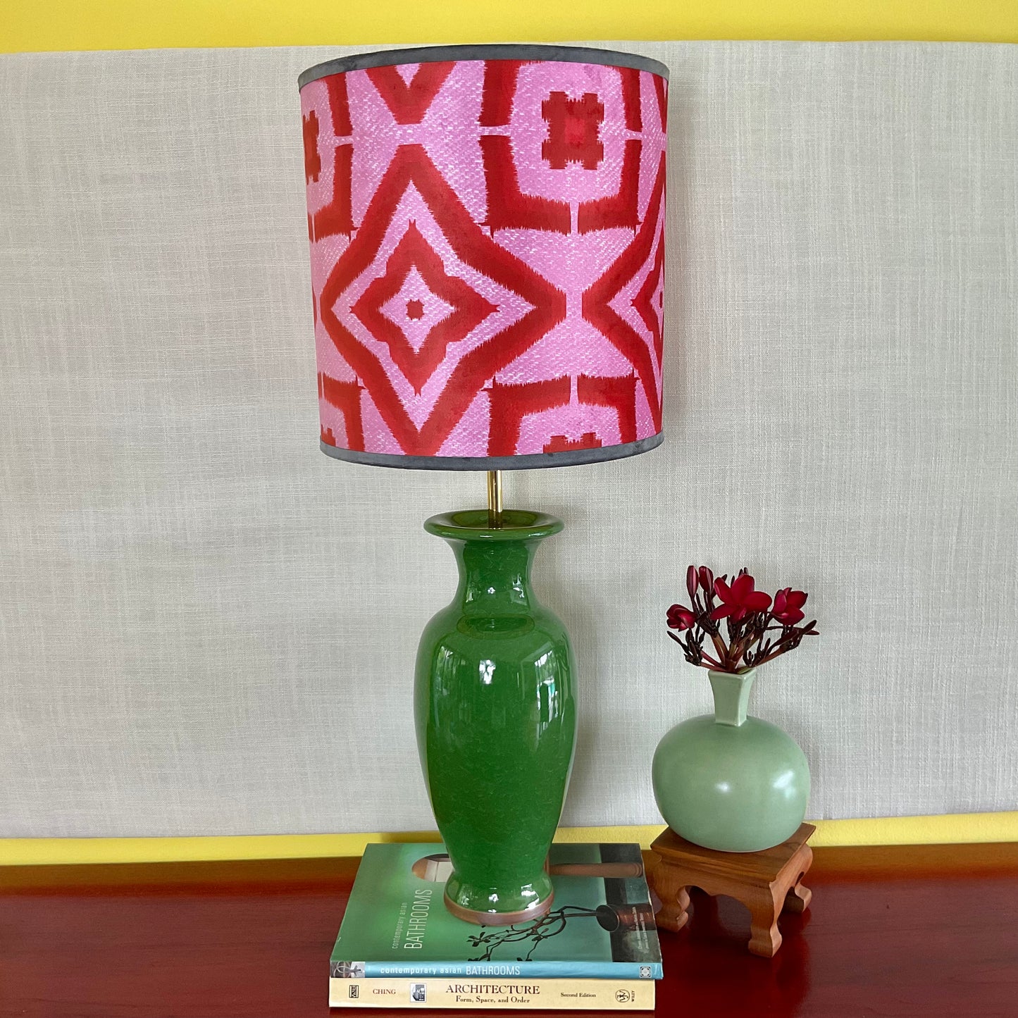 Red ikat pattern lampshade with green ceramic lamp base