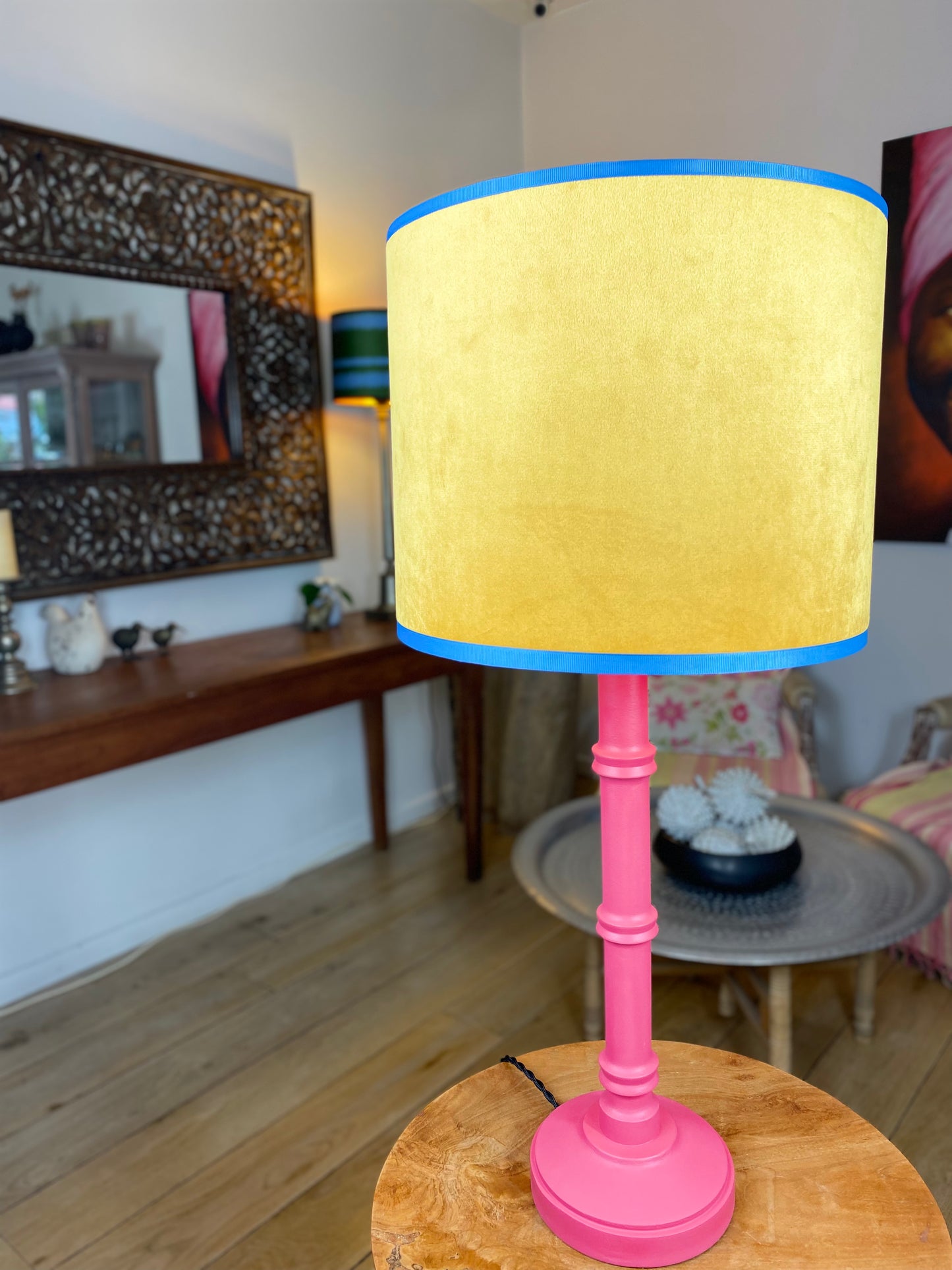 Yellow velvet lampshade with pink wooden lamp base