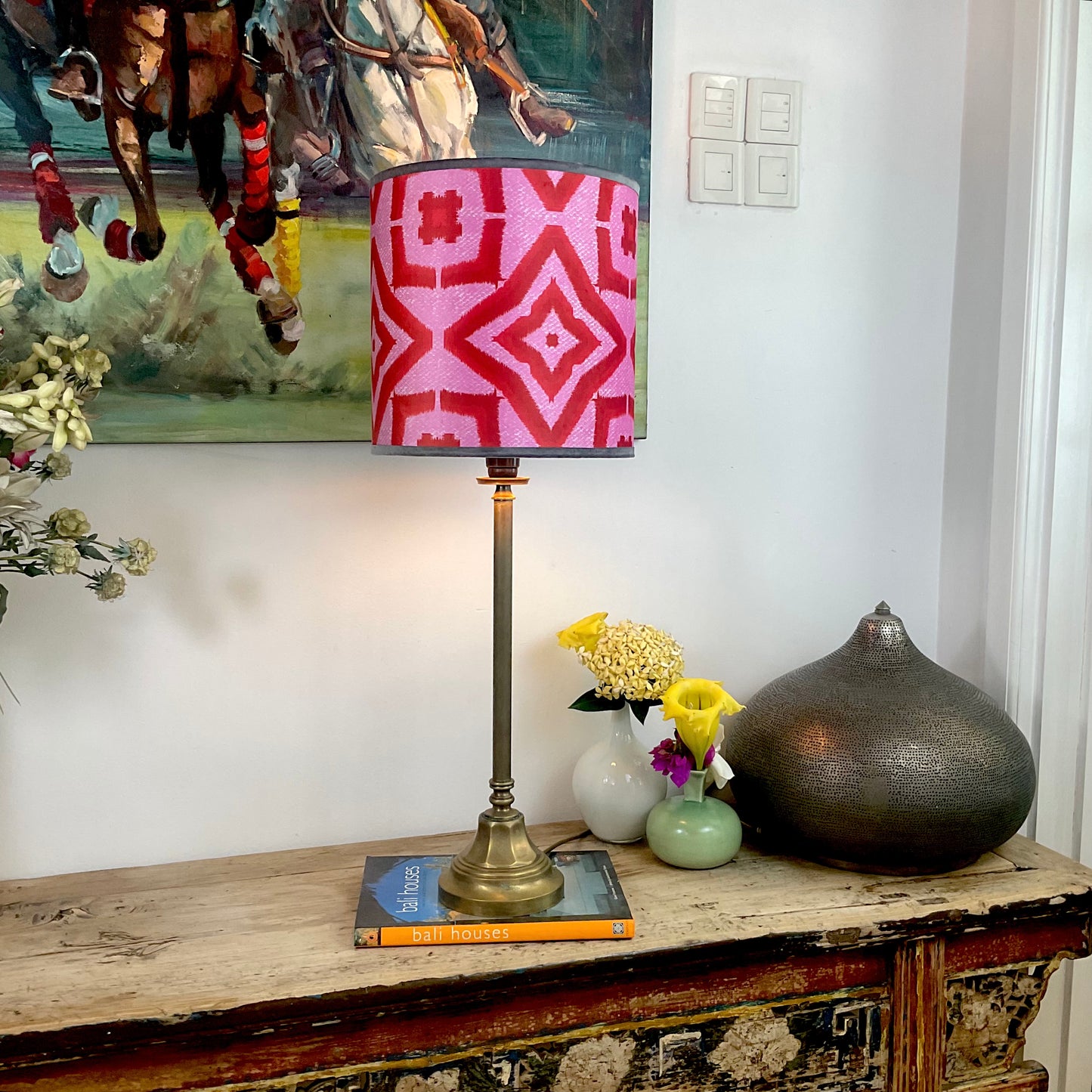 Red ikat pattern lampshade with brass lampbase