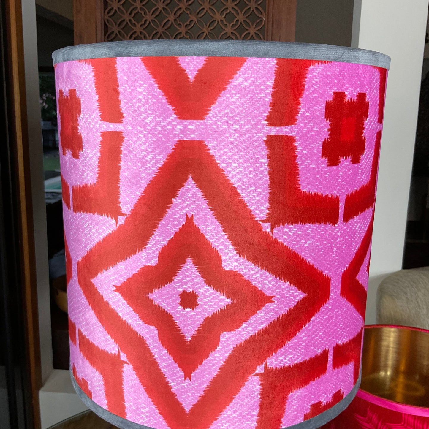 Close up of red ikat pattern lampshade
