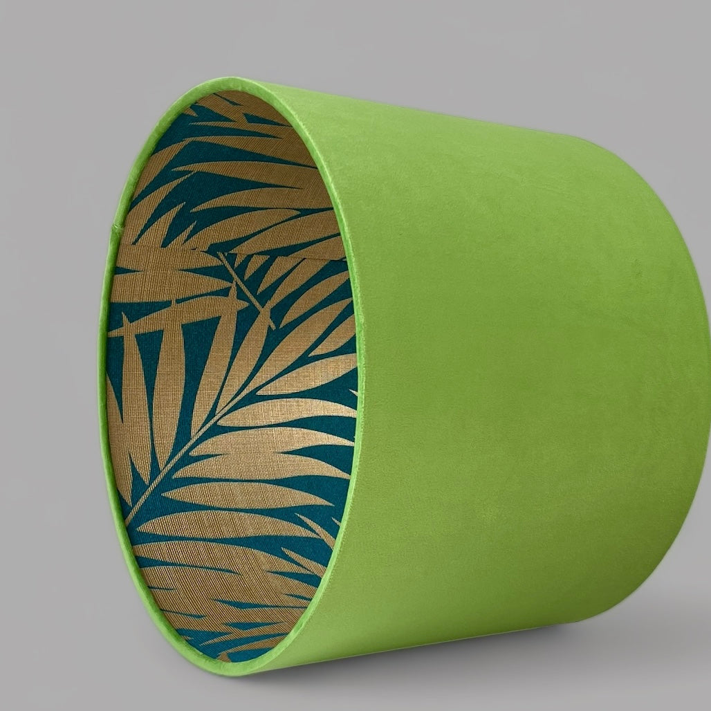 Side view of green velvet lampshade gold palm lining 