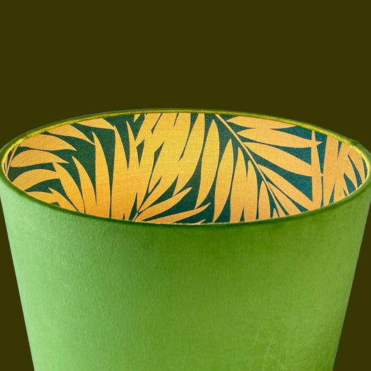 Green velvet lampshde with gold palm inside lining