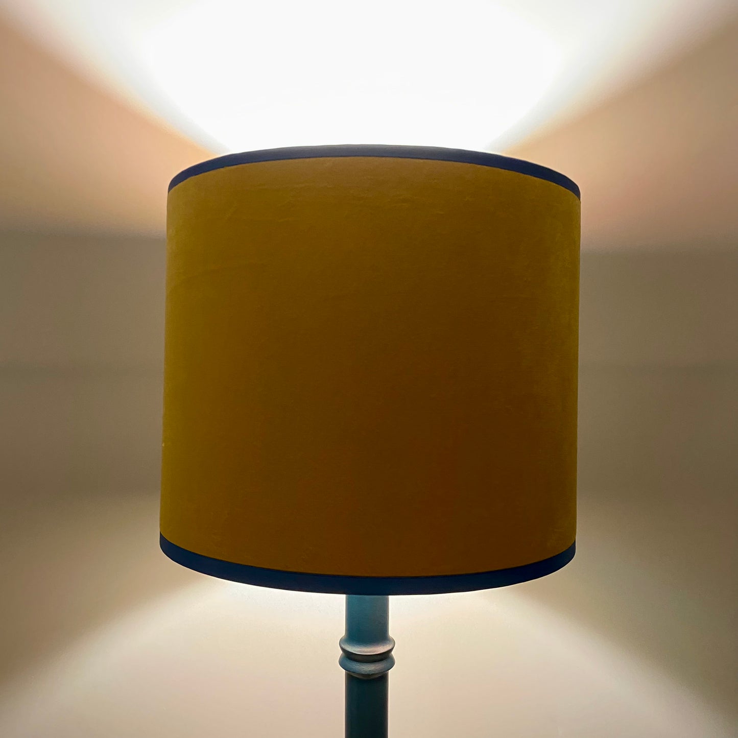 Side view of yellow lampshade when lit up