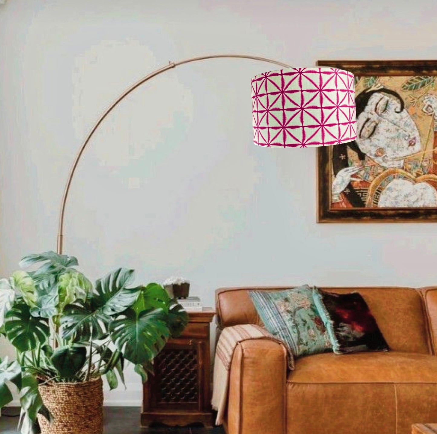 Pink and white lampshade with curved floor lamp