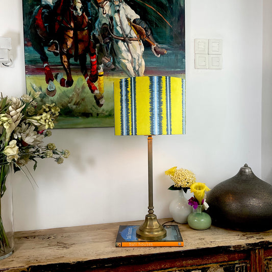 Striped velvet lampshade with brass lamp base