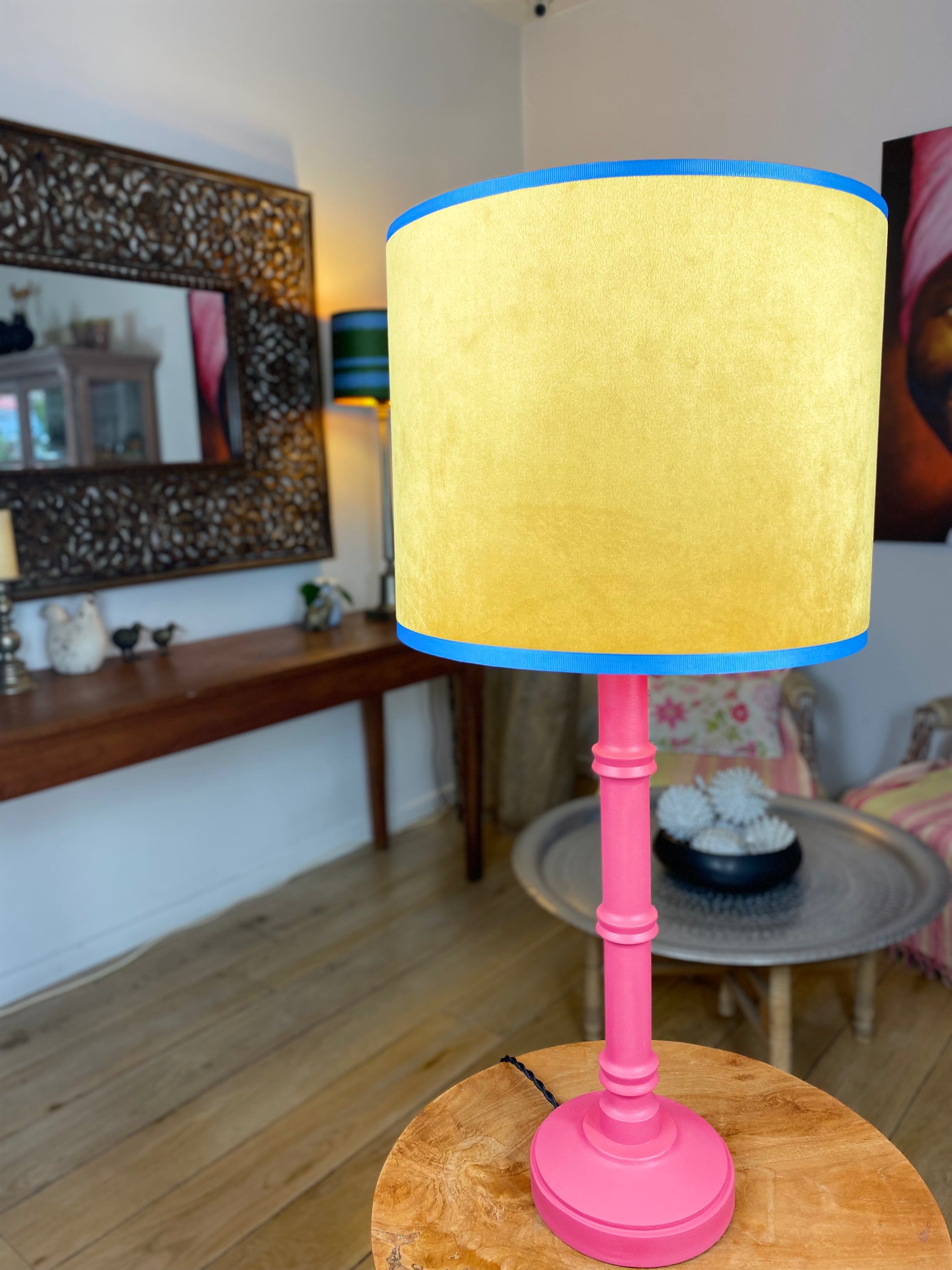 Yellow velvet lampshade with pink wooden lamp base