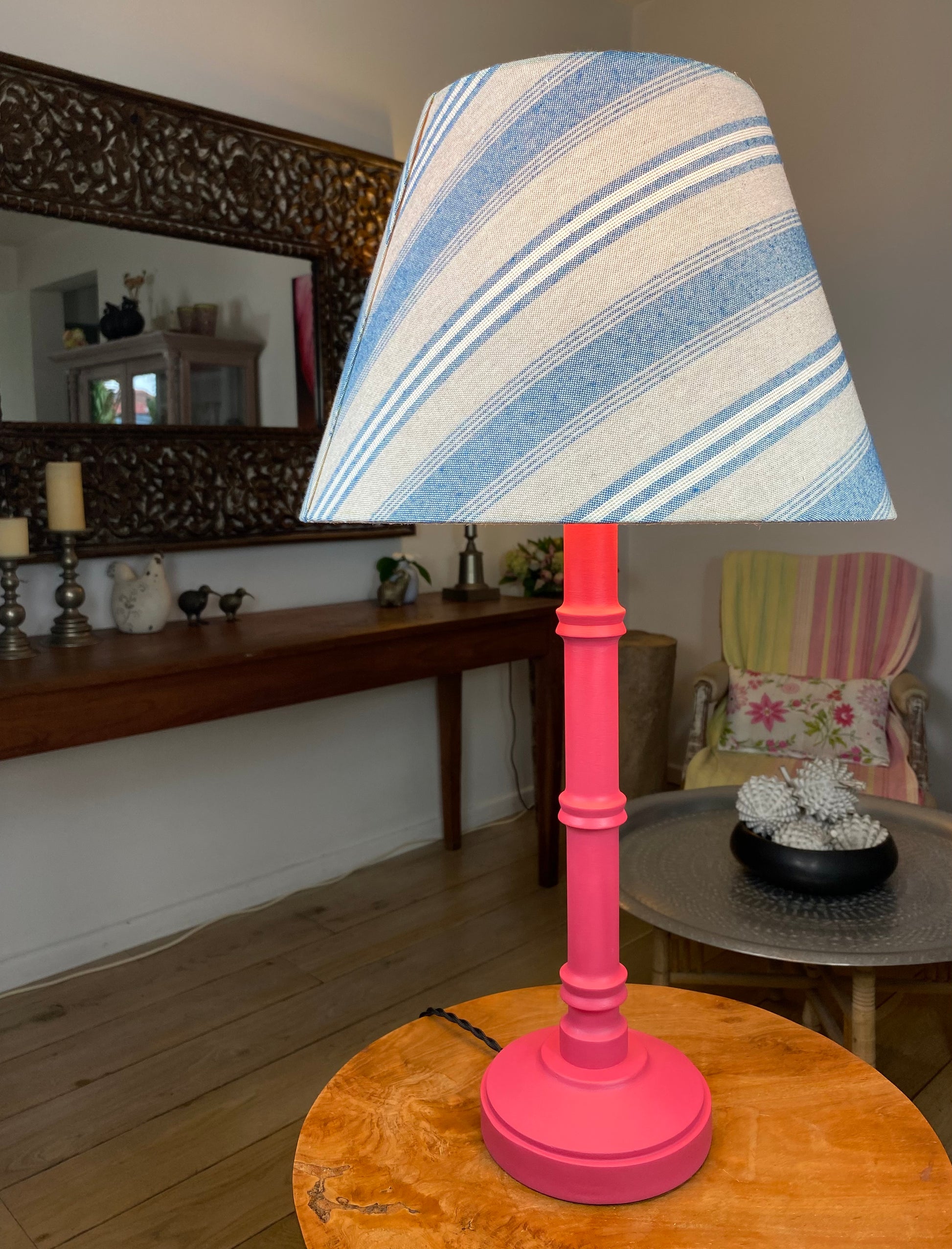 Blue and beige lampshade with pink wooden lamp base