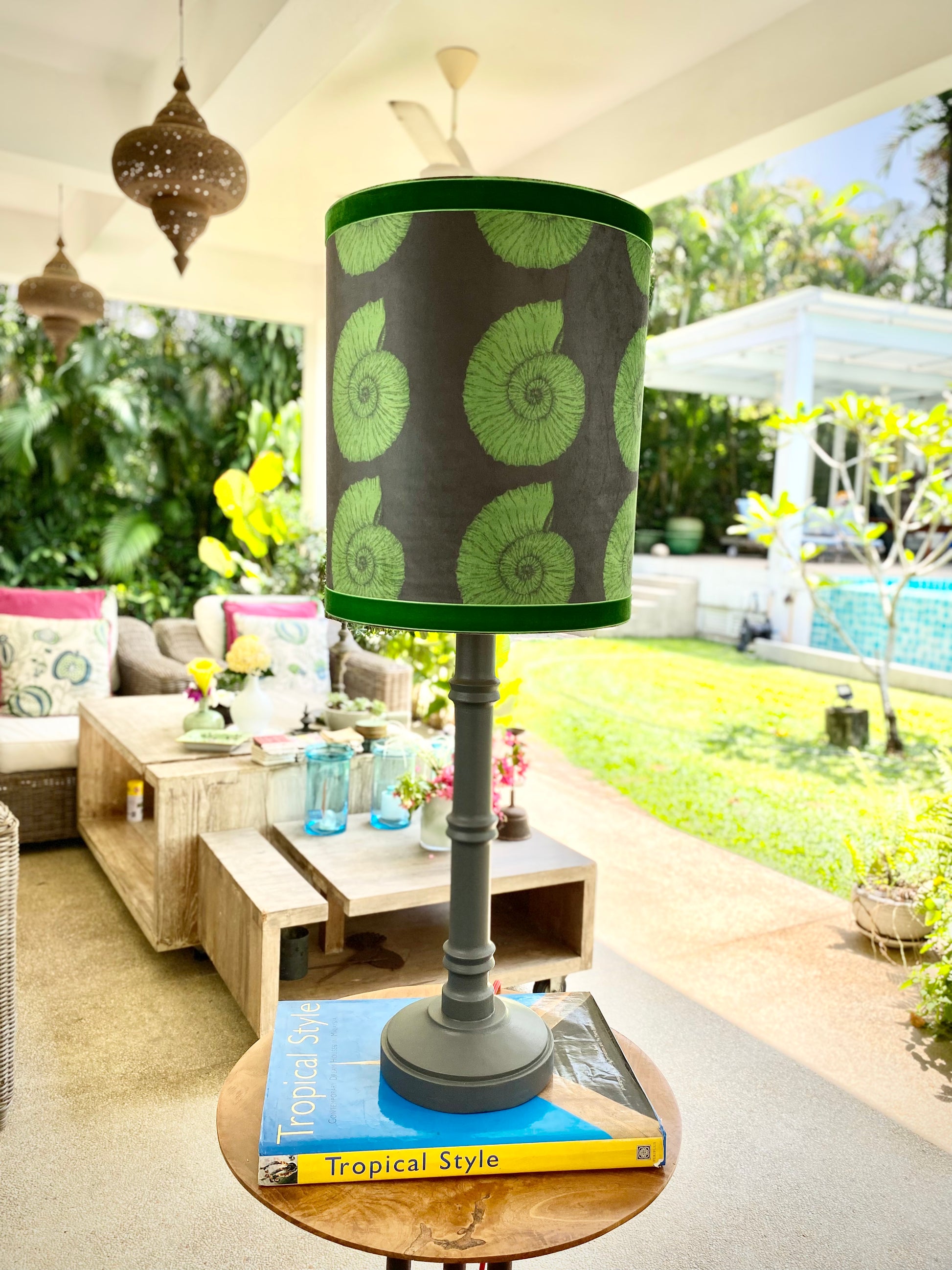 Green seashell pattern lampshade with grey wooden lamp base